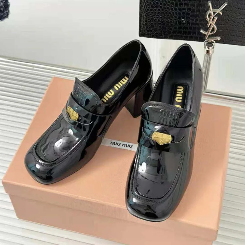 Miu Miu Patent Leather Loafers with Embossed Logo on the Tongue for Women in Black Miu Miu Patent Leather Loafers with Embossed Logo on the Tongue for Women in Black