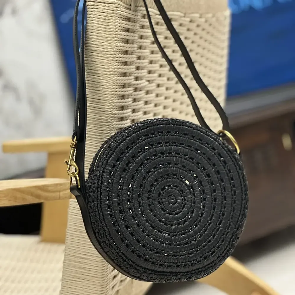 Saint Laurent YSL Round Bag in Raffia and Vegetable-Tanned Leather for Women in Black Saint Laurent YSL Round Bag in Raffia and Vegetable-Tanned Leather for Women in Black