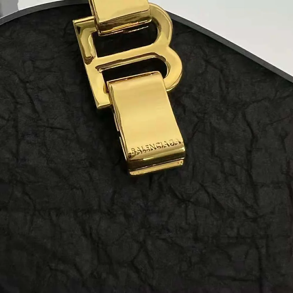 Balenciaga Hourglass Bracelet in Gold Brass for Women Balenciaga Hourglass Bracelet in Gold Brass for Women
