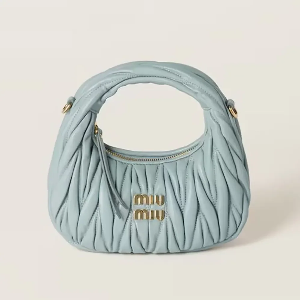 Miu Miu Wander Matelassé Nappa Leather Hobo Mini-Bag for Women in Powder Blue Miu Miu Wander Matelassé Nappa Leather Hobo Mini-Bag for Women in Powder Blue