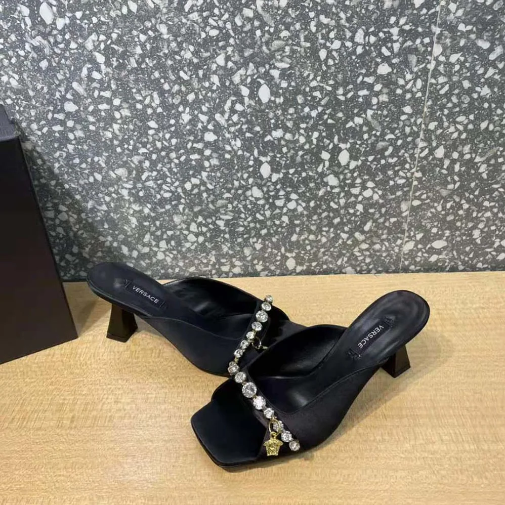 Versace Artifact Mid-Heel Mules for Women in Black Versace Artifact Mid-Heel Mules for Women in Black