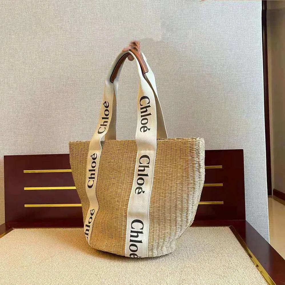 Chloe Large Woody Basket in Fair-Trade Paper with the Woody Ribbon for Women Chloe Large Woody Basket in Fair-Trade Paper with the Woody Ribbon for Women