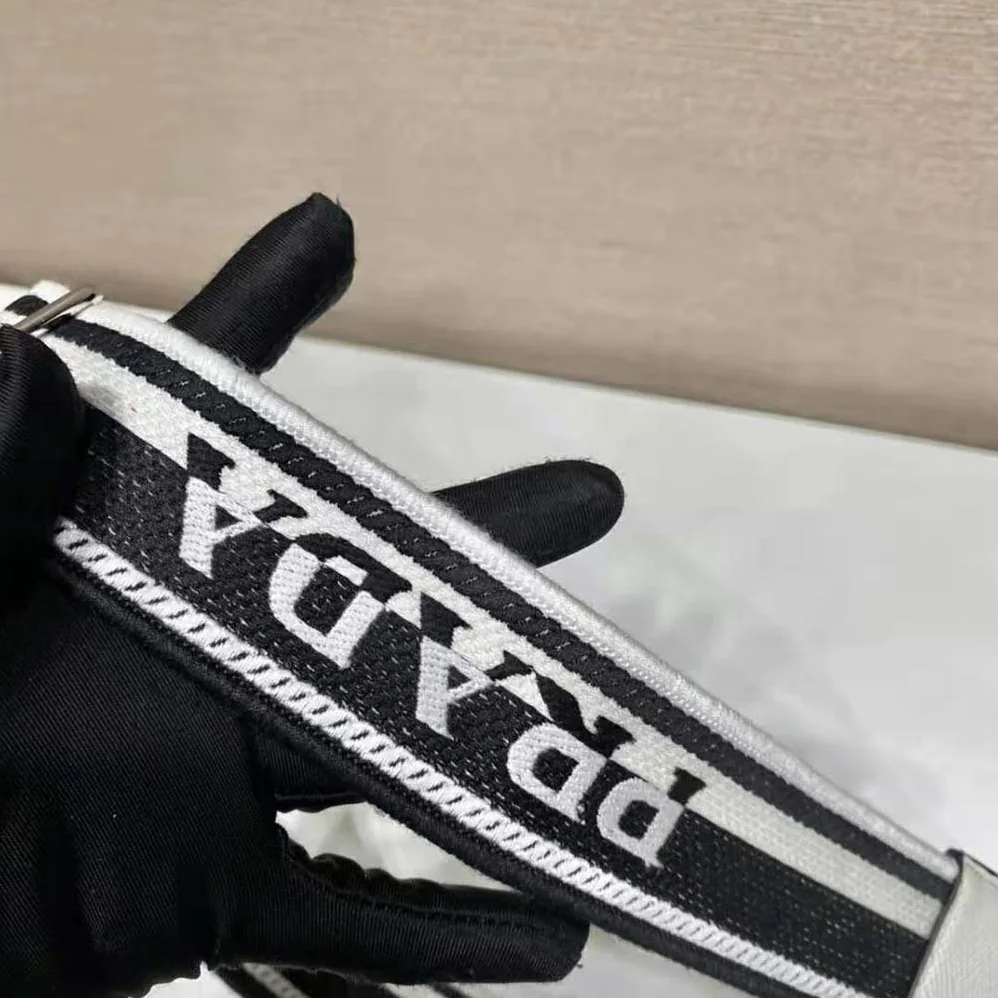 Prada Saffiano Prada Triangle Bag for Women in White Prada Saffiano Prada Triangle Bag for Women in White