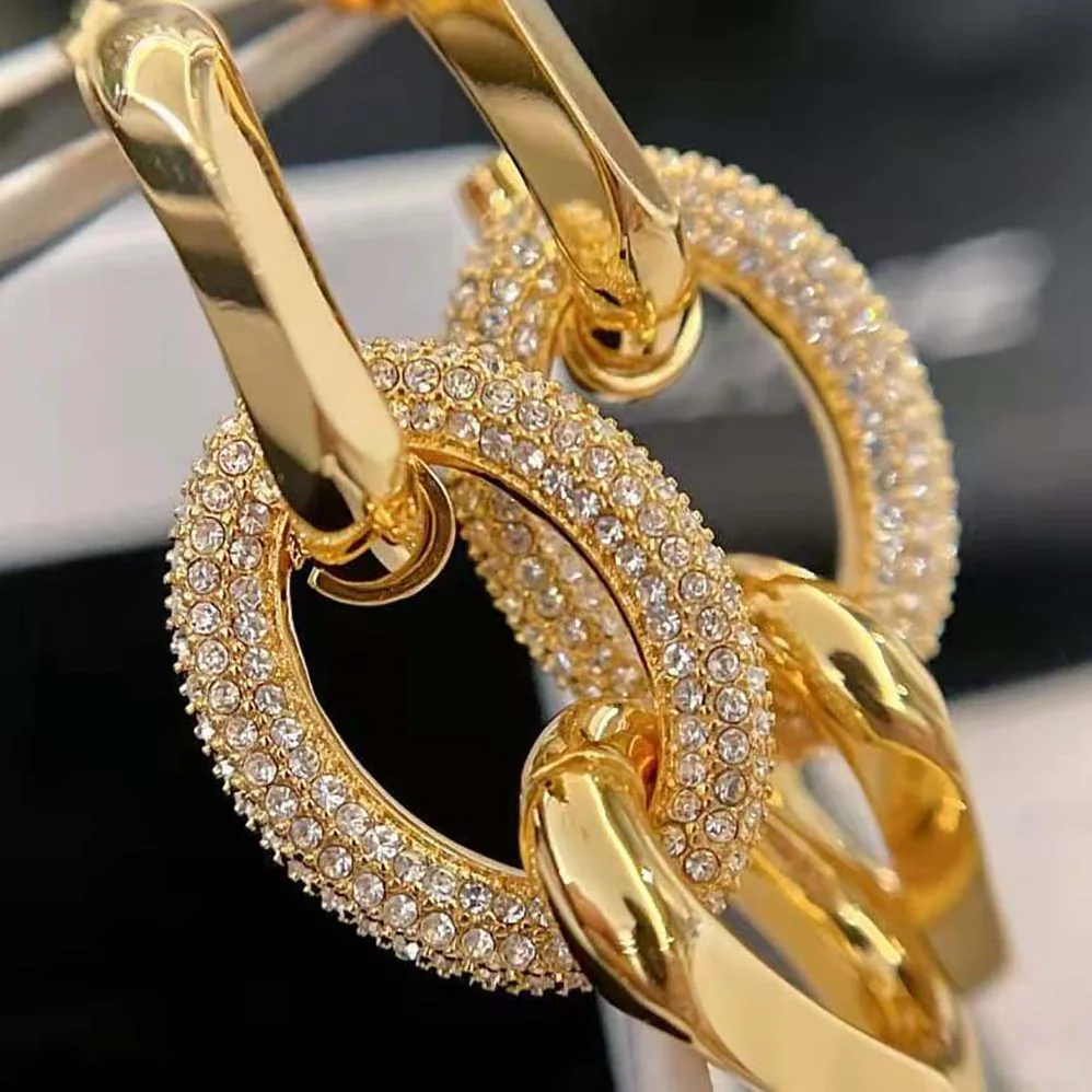 Celine Le Soir Chain Earrings in Brass with Gold Finish and Crystals for Women Celine Le Soir Chain Earrings in Brass with Gold Finish and Crystals for Women
