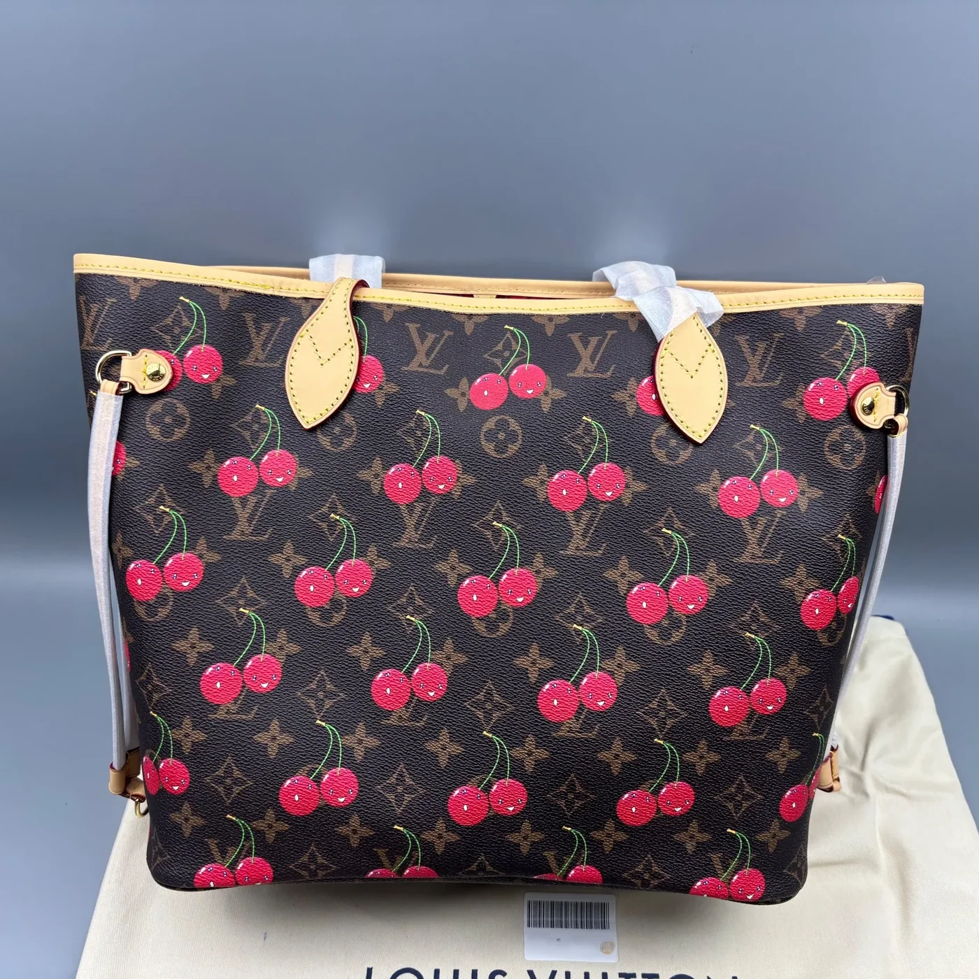 Louis Vuitton LV x TM Neverfull MM Tote Bag in Monogram Cherry Gold Hardware