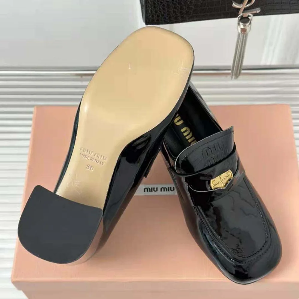 Miu Miu Patent Leather Loafers with Embossed Logo on the Tongue for Women in Black Miu Miu Patent Leather Loafers with Embossed Logo on the Tongue for Women in Black