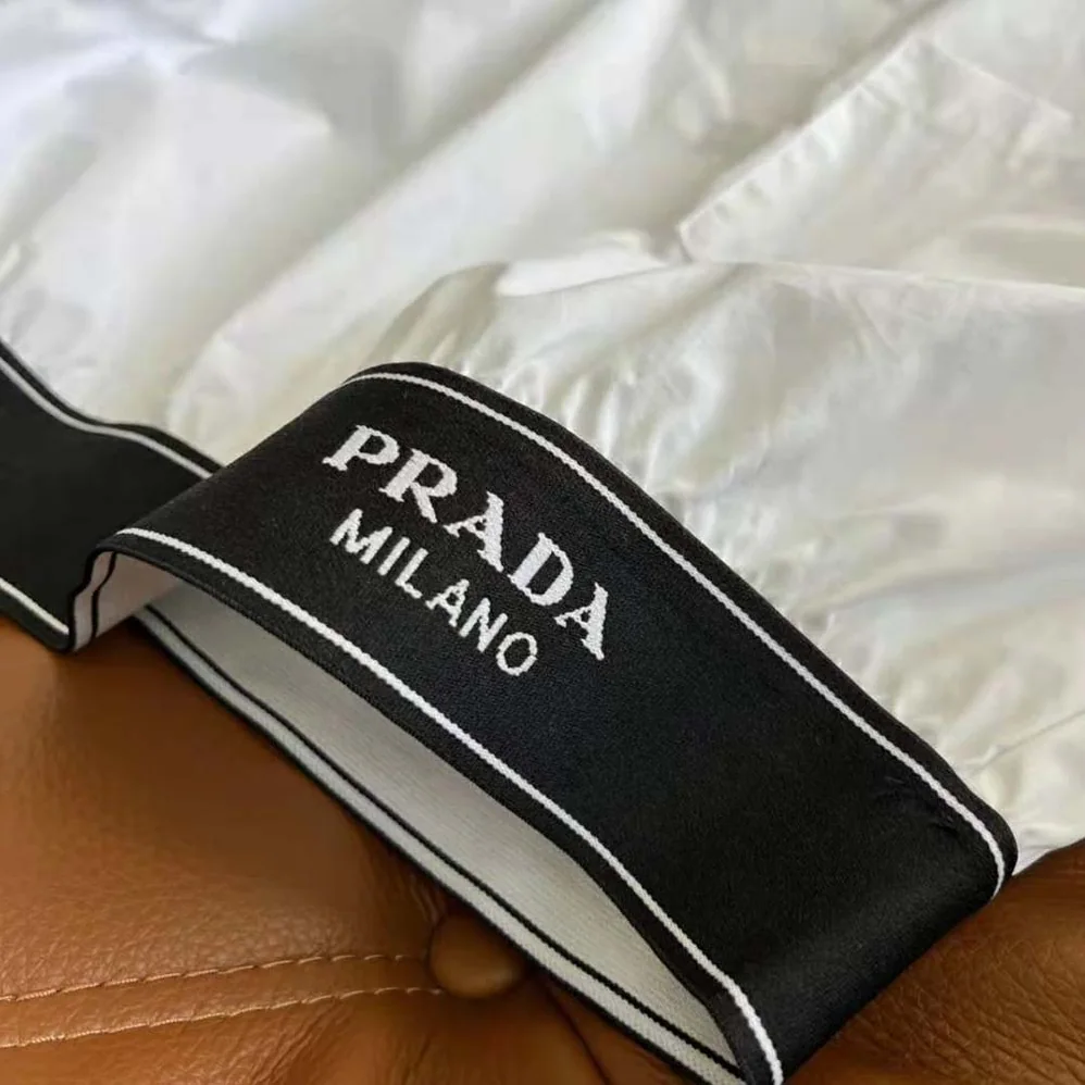 Prada Stretch Poplin Shirt with a Hybrid Design Reinvents for Women Prada Stretch Poplin Shirt with a Hybrid Design Reinvents for Women