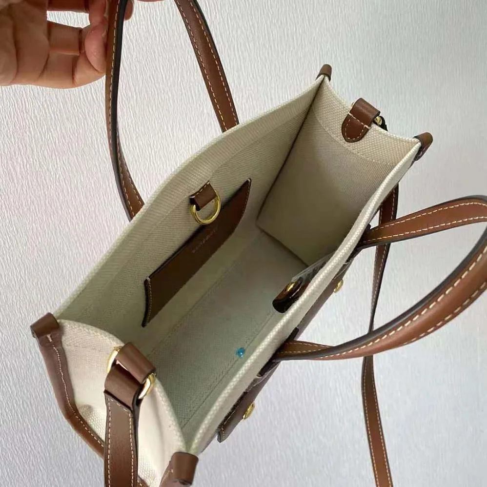 Burberry Mini Two-tone Canvas and Leather Freya Bag for Women in Brown Burberry Mini Two-tone Canvas and Leather Freya Bag for Women in Brown