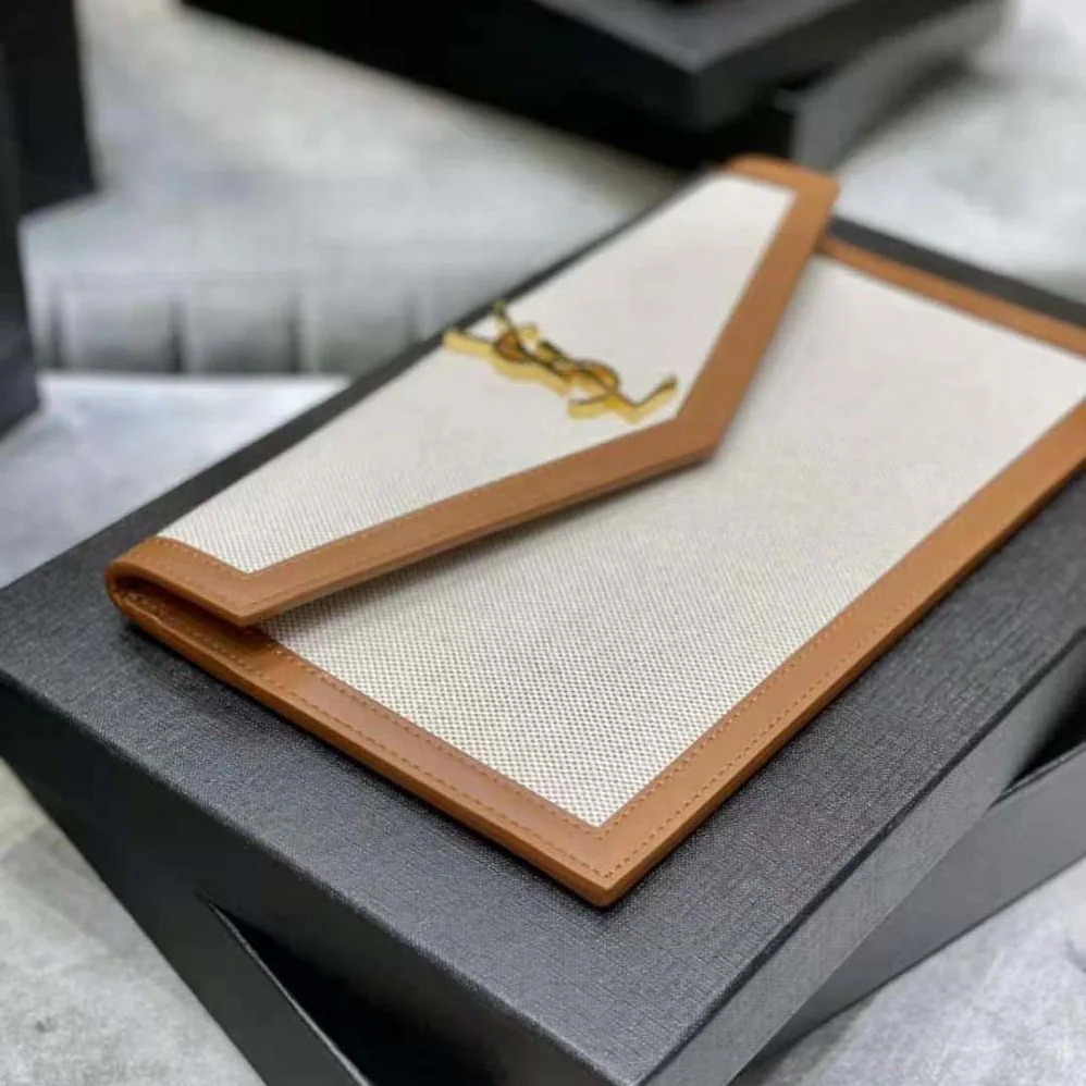 Saint Laurent YSL Uptown Pouch in Canvas and Smooth Leather for Women