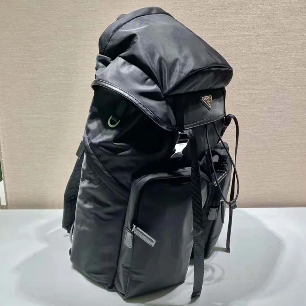 Prada Re-Nylon and Saffiano Leather Backpack with Triangle Logo for Unisex in Black