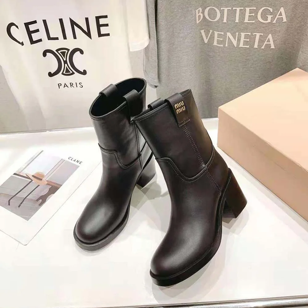 Miu Miu Leather Booties with Hot-stamped Logo for Women in Black