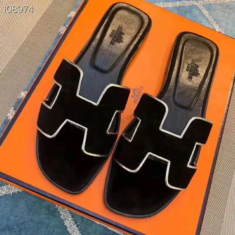 Hermes Oran Sandal in Velvet and Nappa Leather with Metallic Finish and Iconic “H” Cut-Out for Women in Black Hermes Oran Sandal in Velvet and Nappa Leather with Metallic Finish and Iconic “H” Cut-Out for Women in Black