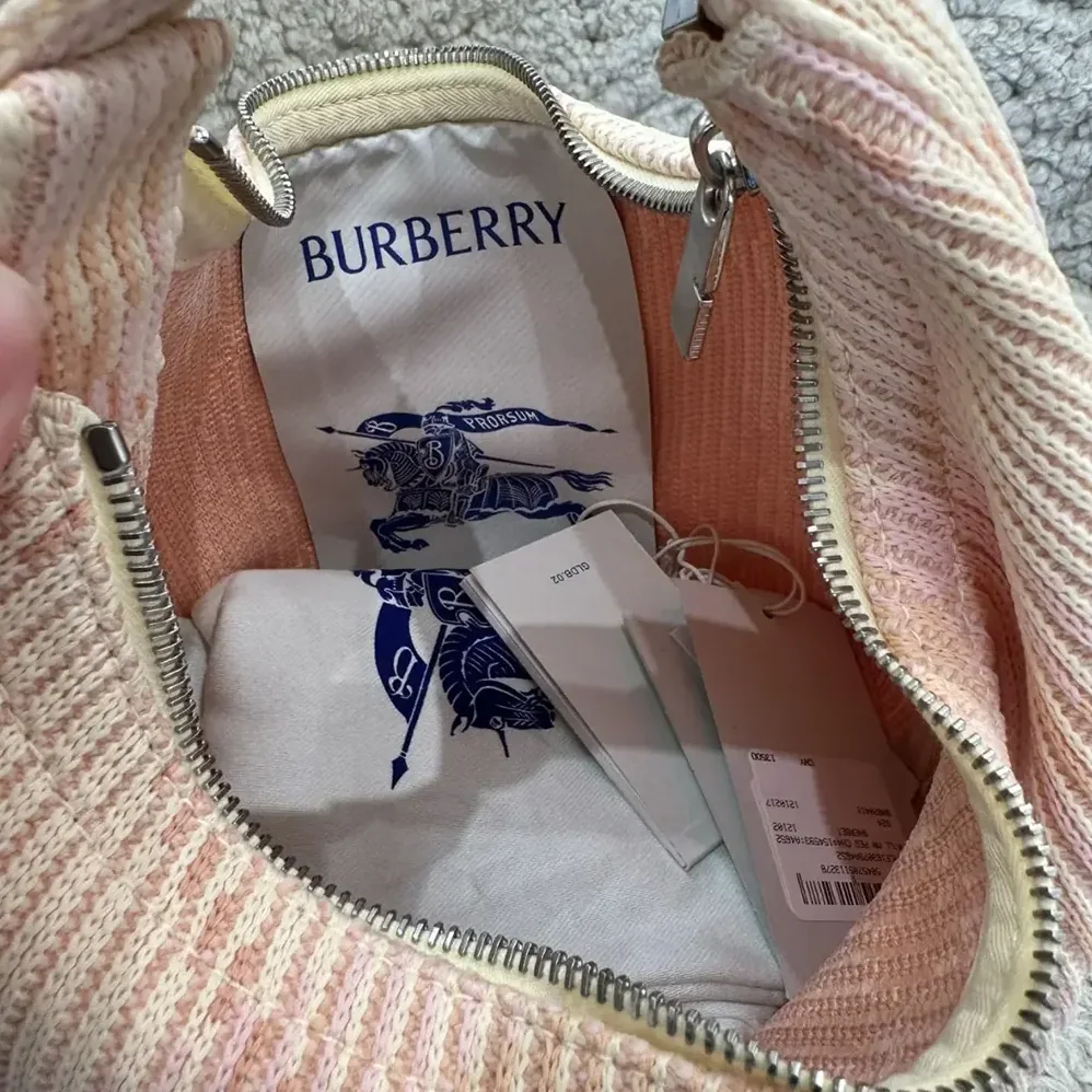 Burberry Mini Peg Duffle Bag for Women in Pink