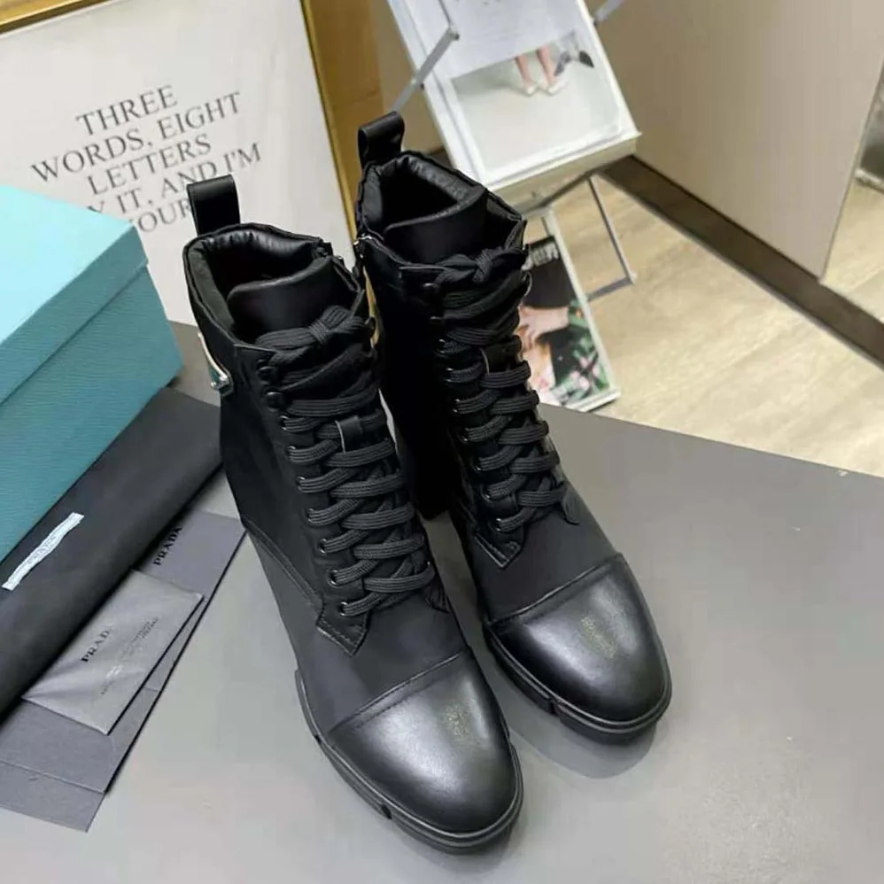 Prada Brushed Leather and Nylon Booties for Women in Black Prada Brushed Leather and Nylon Booties for Women in Black