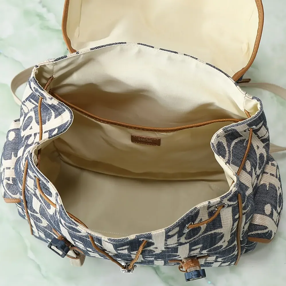 Dior Hit the Road Backpack with Flap Blue and Beige Raffia for Men in Effect Dior Oblique Denim Dior Hit the Road Backpack with Flap Blue and Beige Raffia for Men in Effect Dior Oblique Denim