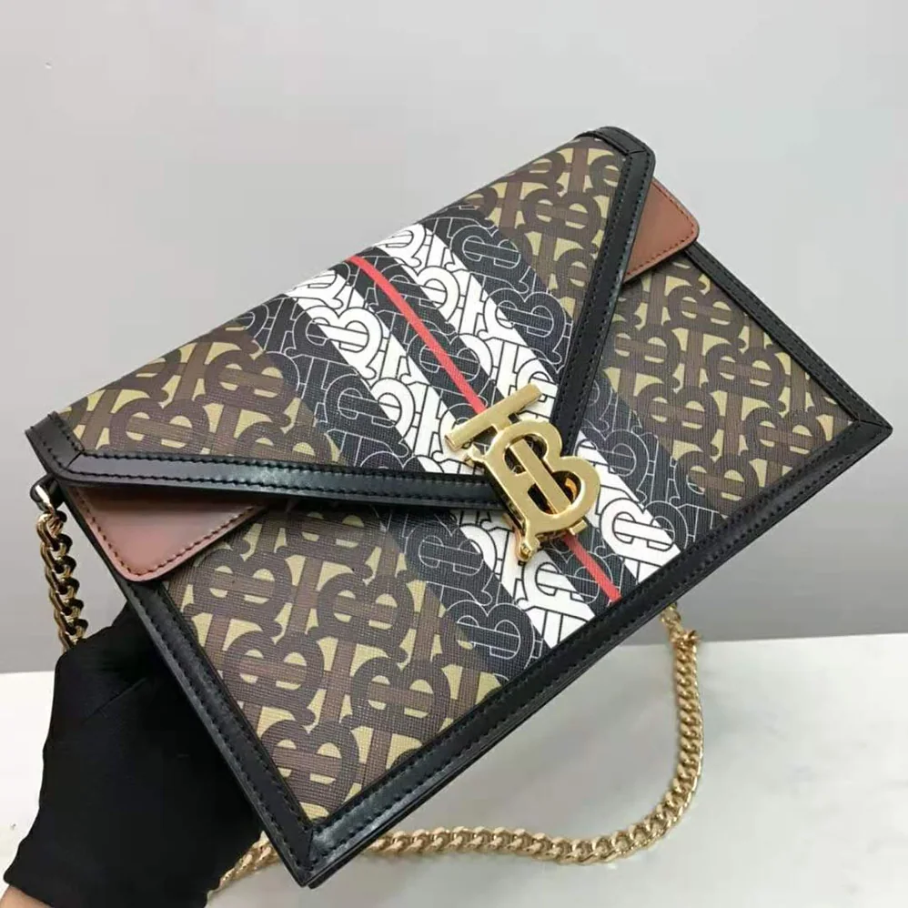 Burberry Small Monogram Stripe E for Women in canvas TB Envelope Clutch Burberry Small Monogram Stripe E for Women in canvas TB Envelope Clutch