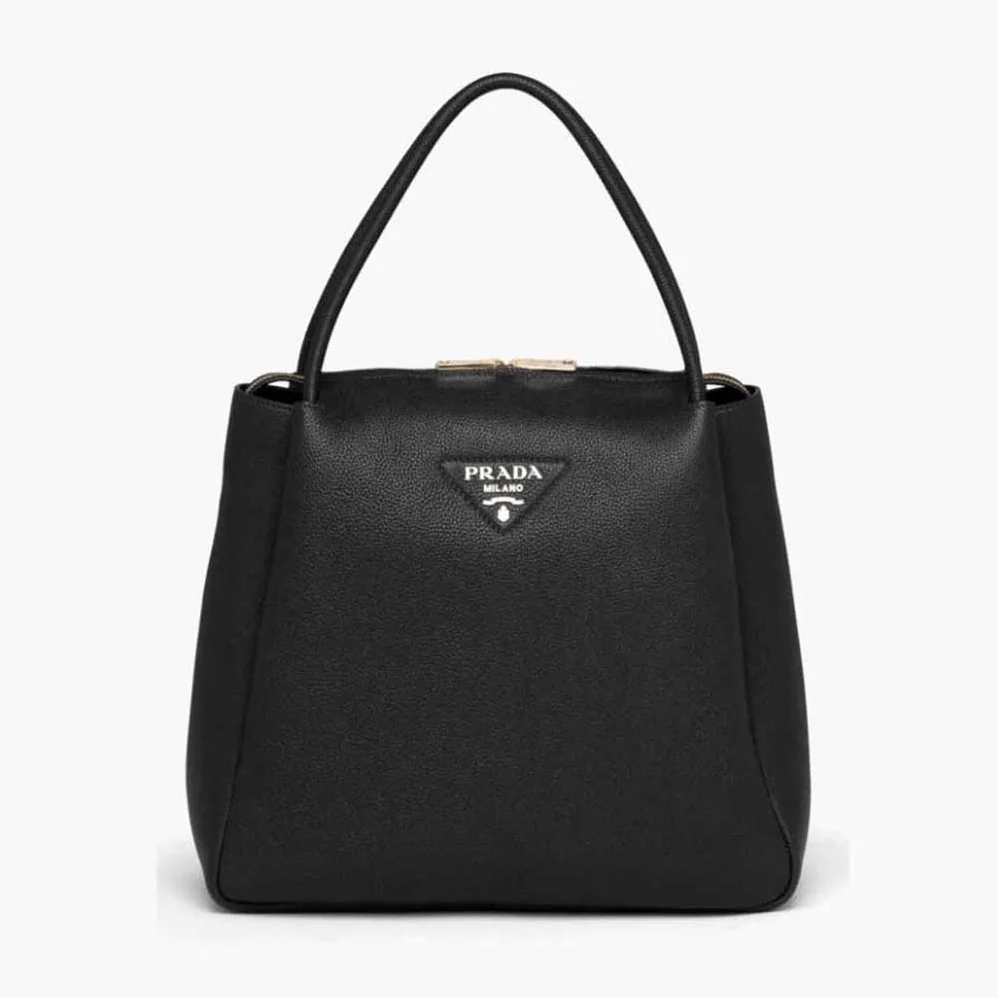 Prada Medium Leather handbag with the Prada Metal Lettering Logo Illuminating Its Center for Women in Black Prada Medium Leather handbag with the Prada Metal Lettering Logo Illuminating Its Center for Women in Black