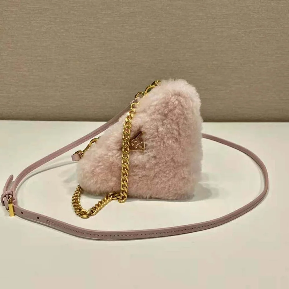 Prada Shearling and Saffiano Leather Mini-Pouch for Women in Pink Prada Shearling and Saffiano Leather Mini-Pouch for Women in Pink