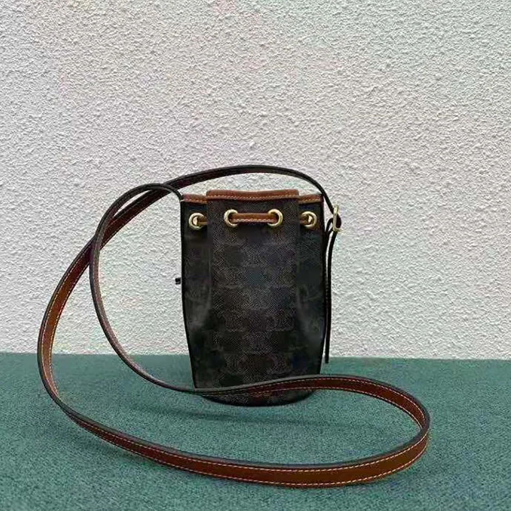 Celine Micro Drawstring in Triomphe Canvas and Calfskin for Women in Brown Celine Micro Drawstring in Triomphe Canvas and Calfskin for Women in Brown