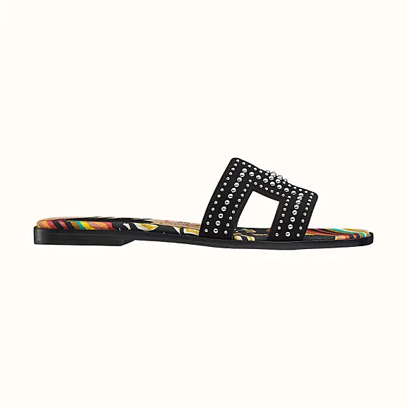 Hermes Oran Sandal in Suede Goatskin with Palladium Plated Studs and Iconic “H” Cut-Out for Women in Black