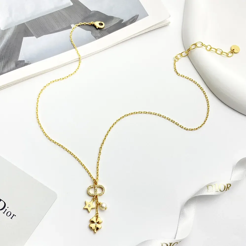 Dior Petit CD Lucky Charms Necklace Gold-Finish Metal with a White Resin Pearl and Silver for Women in Tone Crystals Dior Petit CD Lucky Charms Necklace Gold-Finish Metal with a White Resin Pearl and Silver for Women in Tone Crystals