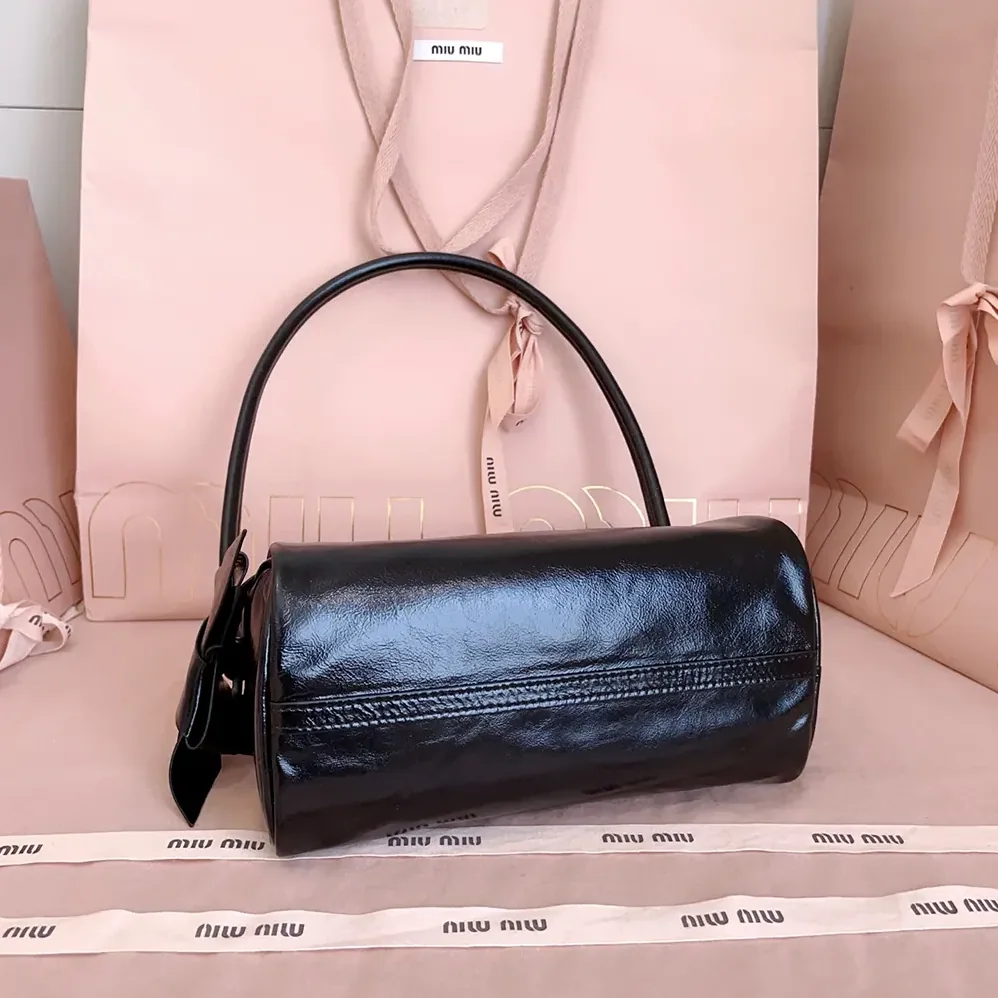 Miu Miu Shiny Leather Pouch for Women in Black Miu Miu Shiny Leather Pouch for Women in Black