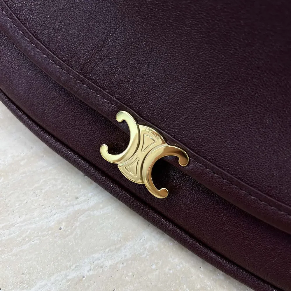 Celine Little Halfmoon Soft Triomphe in Supple Shiny Lambskin for Women in Maroon Celine Little Halfmoon Soft Triomphe in Supple Shiny Lambskin for Women in Maroon