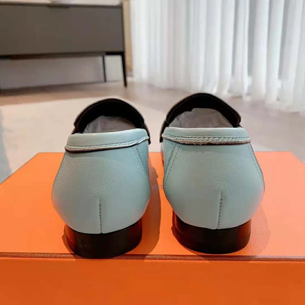 Hermes Paris Loafer in Calfskin with Palladium Plated Signature “H” Detail for Women in Blue Hermes Paris Loafer in Calfskin with Palladium Plated Signature “H” Detail for Women in Blue