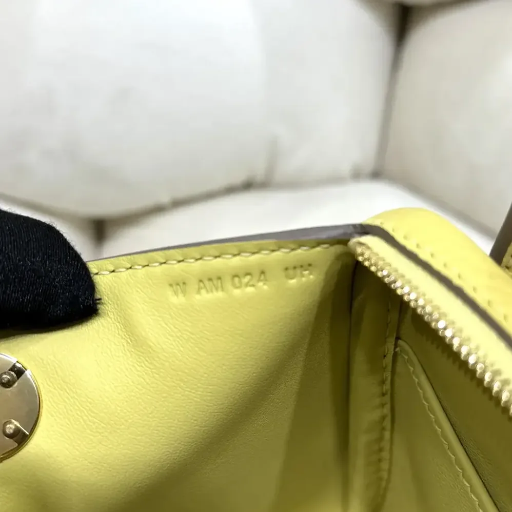 Hermes Lindy Mini 19 in Clemence Leather for Women in Yellow/Gold Hermes Lindy Mini 19 in Clemence Leather for Women in Yellow/Gold