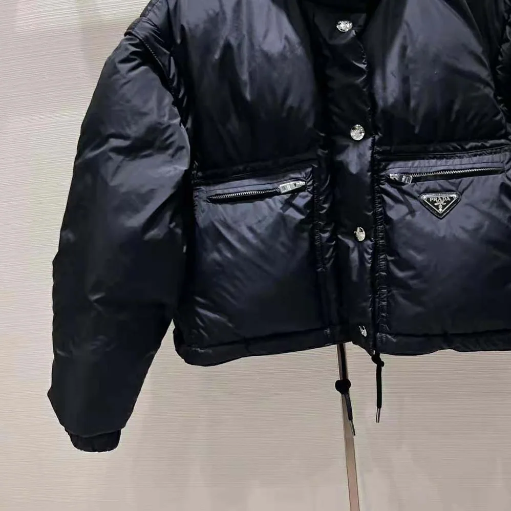 Prada Cropped Re-Nylon Down Jacket for Women in Black Prada Cropped Re-Nylon Down Jacket for Women in Black