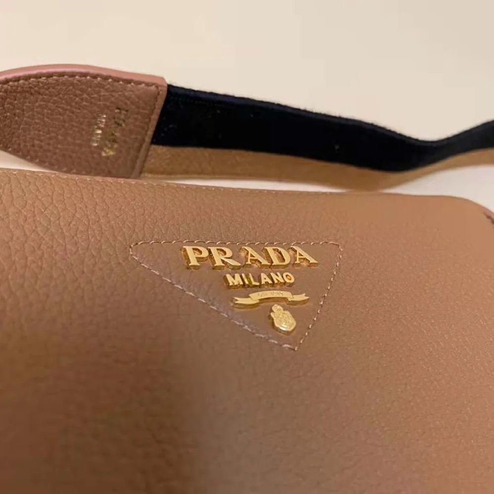 Prada Leather Shoulder Bag with Metal Lettering Logo for Women in Brown