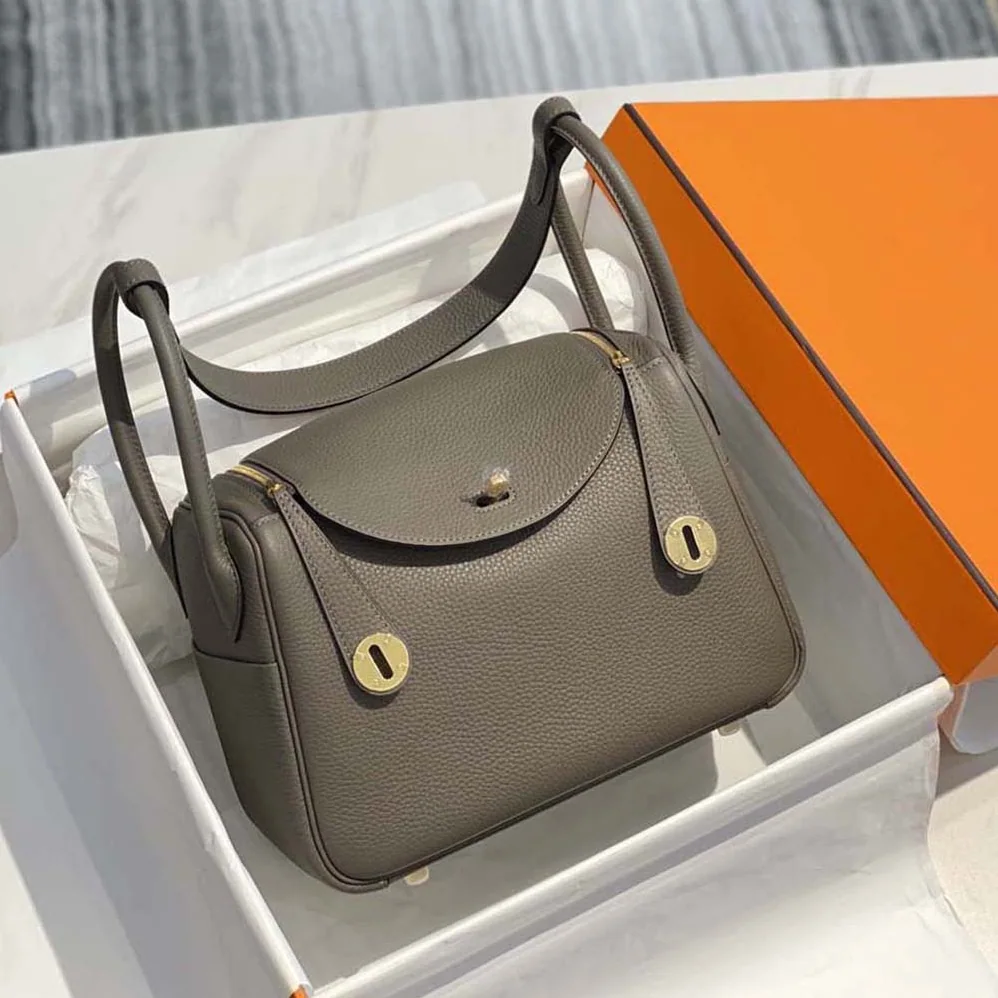 Hermes Lindy 26 in Clemence Leather for Women in Gray/Gold Hermes Lindy 26 in Clemence Leather for Women in Gray/Gold