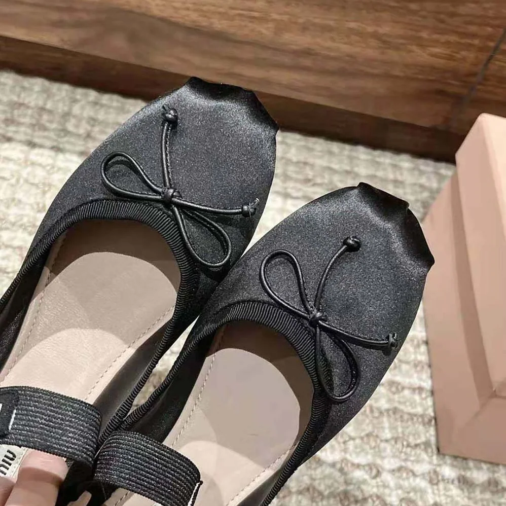 Miu Miu Satin Ballerinas with Knit Logo Label for Women in Black Miu Miu Satin Ballerinas with Knit Logo Label for Women in Black