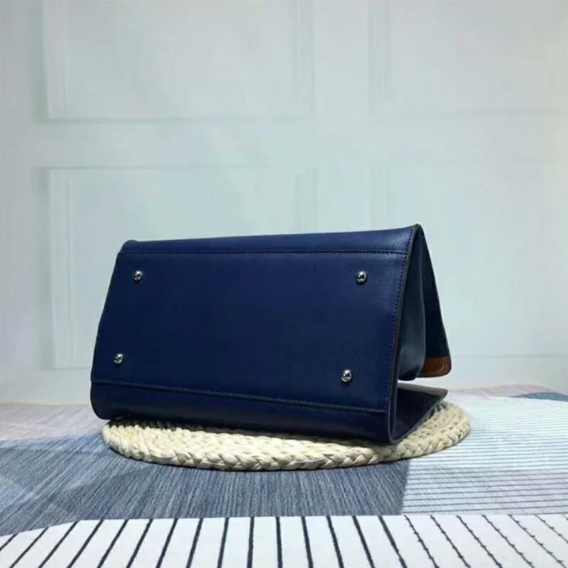 Burberry The Leather Crest Grommet Detail Tote for Women in Blue