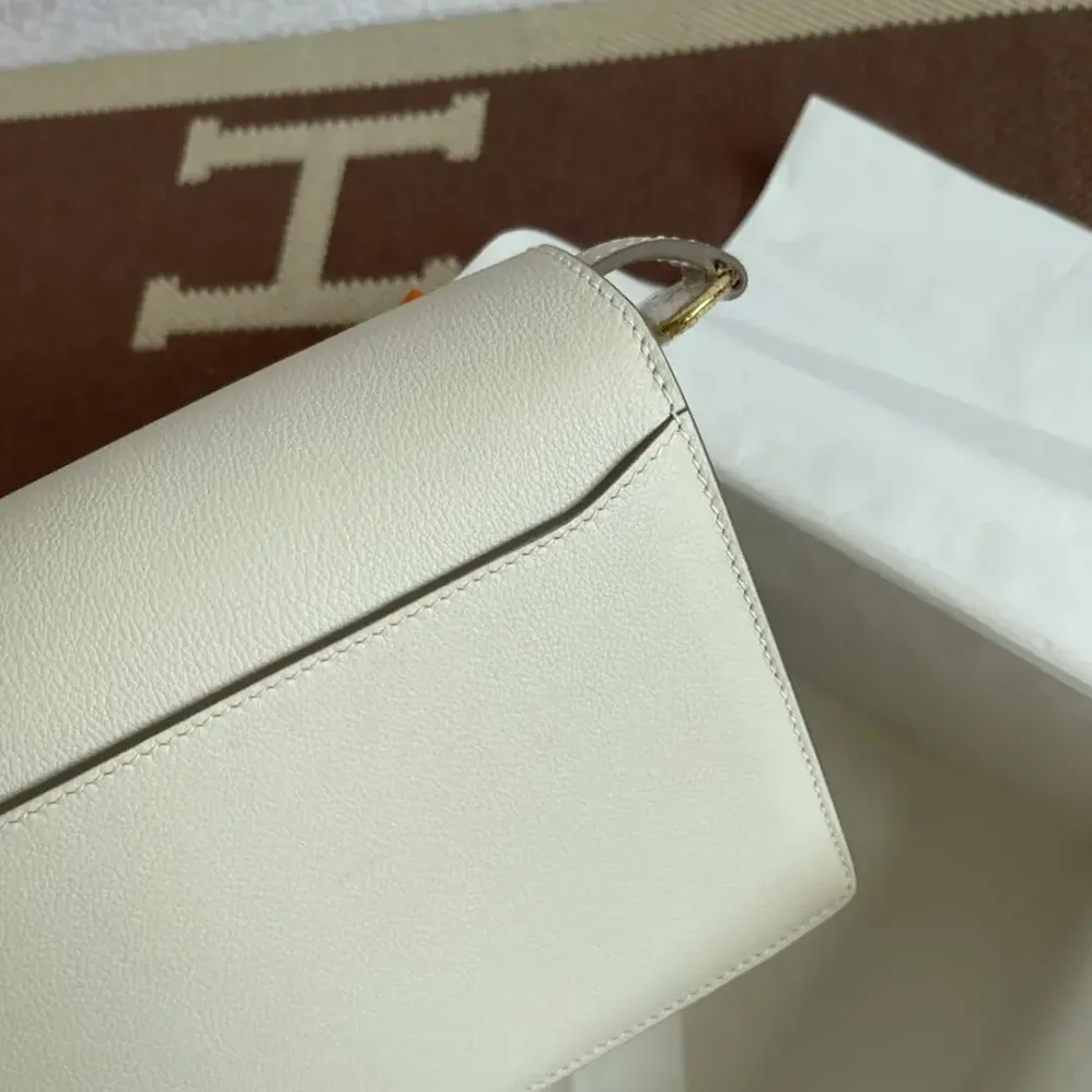 Hermes Roulis Mini Bag in Evercolor Calfskin for Women in White/Gold Hermes Roulis Mini Bag in Evercolor Calfskin for Women in White/Gold
