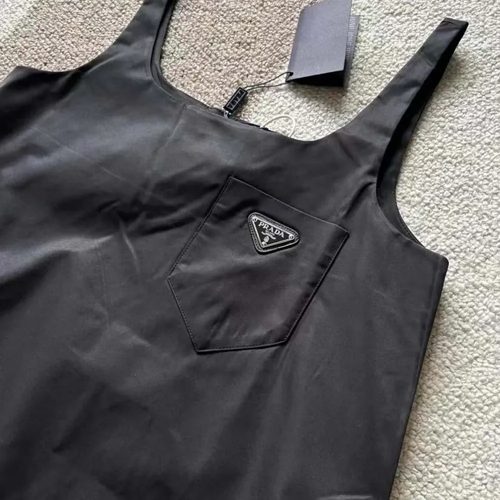 Prada Re-Nylon Mini-dress with Metal Triangle Logo for Women in Black Prada Re-Nylon Mini-dress with Metal Triangle Logo for Women in Black