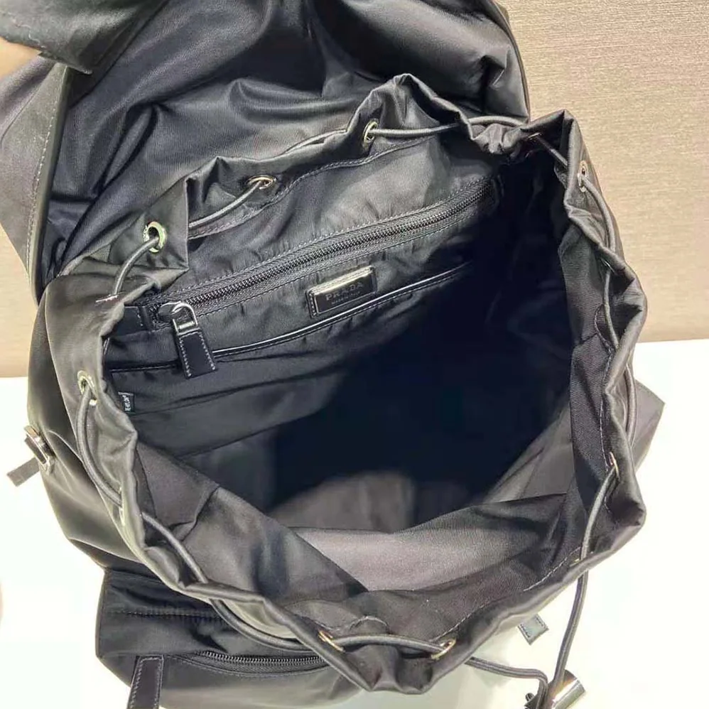 Prada Re-Nylon and Leather Backpack for Unisex in Black Prada Re-Nylon and Leather Backpack for Unisex in Black