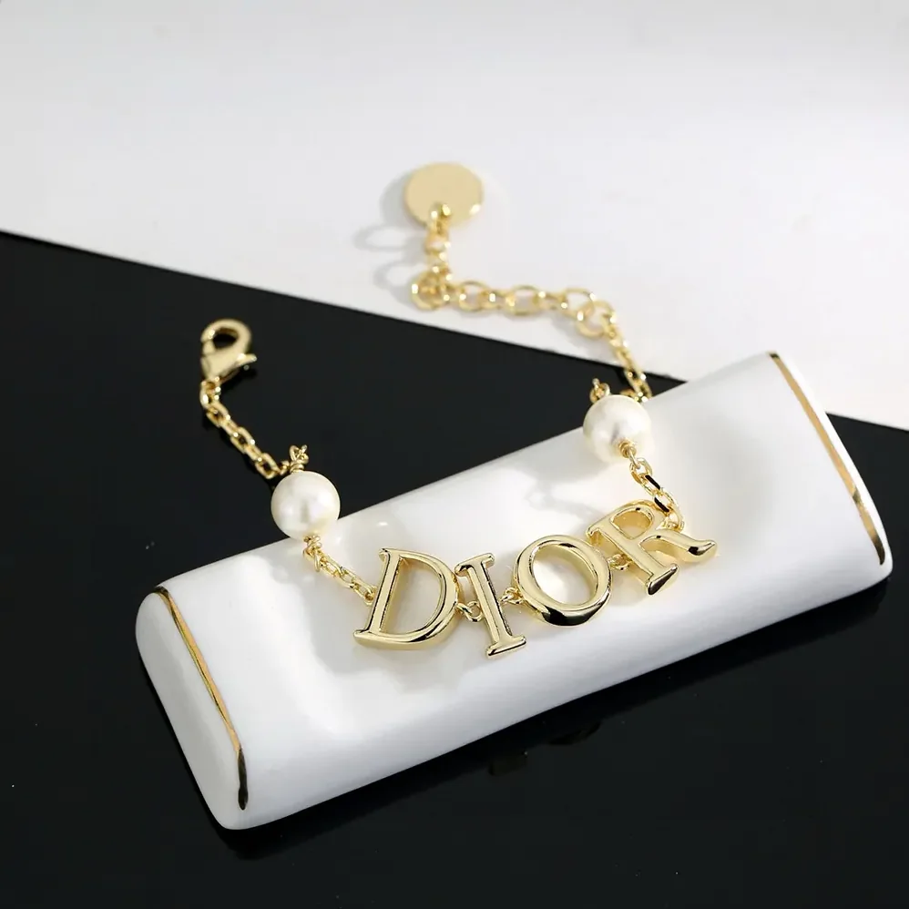 Dior Dio(r)evolution Bracelet Gold-Finish Metal and White Resin Pearls for Women Dior Dio(r)evolution Bracelet Gold-Finish Metal and White Resin Pearls for Women