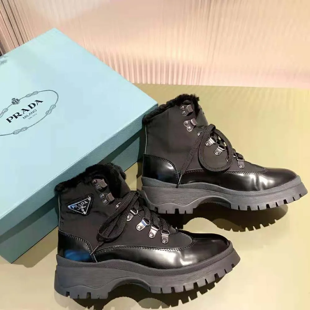 Prada Brixxen Leather and Nylon Booties for Women in Black