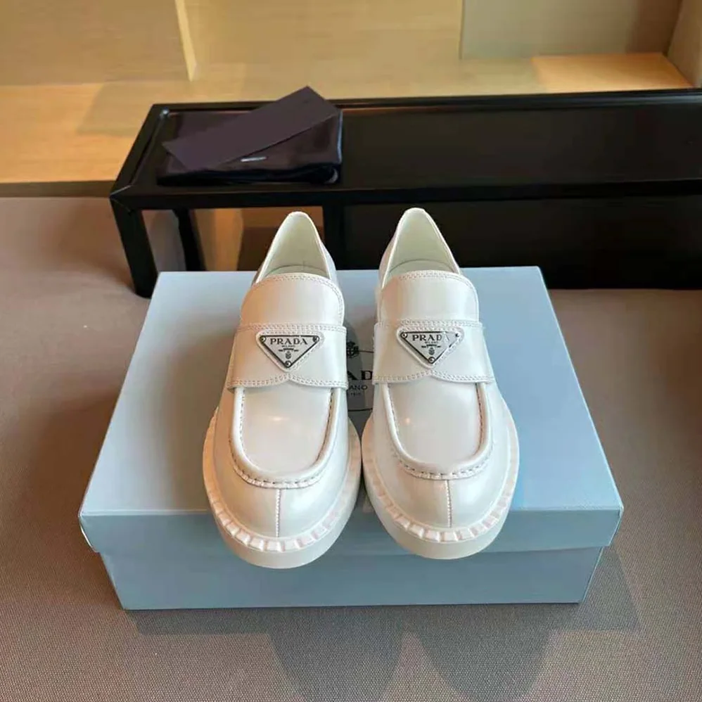 Prada Brushed Leather Loafers for Women in White Prada Brushed Leather Loafers for Women in White