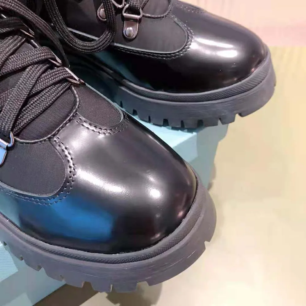 Prada Brixxen Leather and Nylon Booties for Women in Black