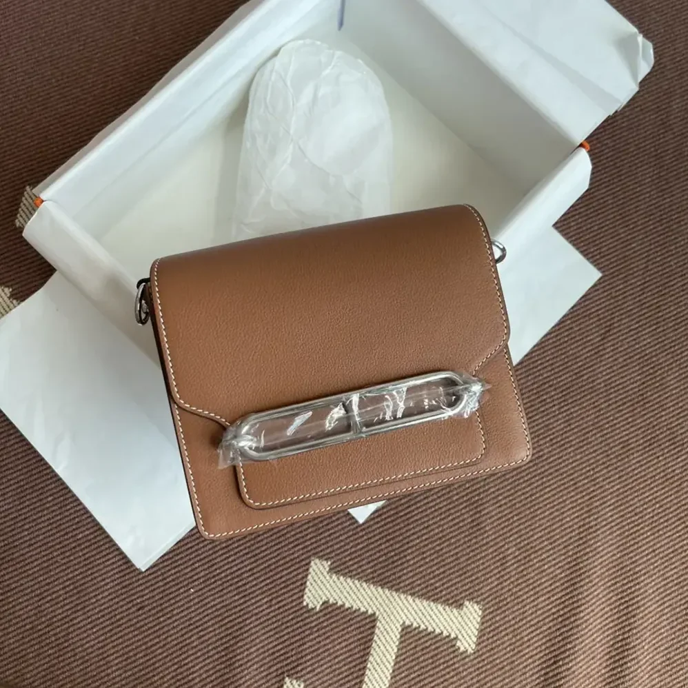 Hermes Roulis Mini Bag in Evercolor Calfskin for Women in Brown/Silver Hermes Roulis Mini Bag in Evercolor Calfskin for Women in Brown/Silver