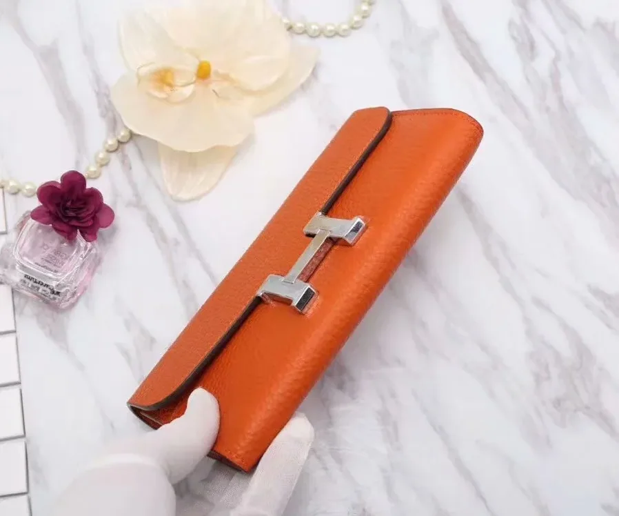 Hermes Constance Togo Long Wallet in Silver Toned Hardware Orange Hermes Constance Togo Long Wallet in Silver Toned Hardware Orange