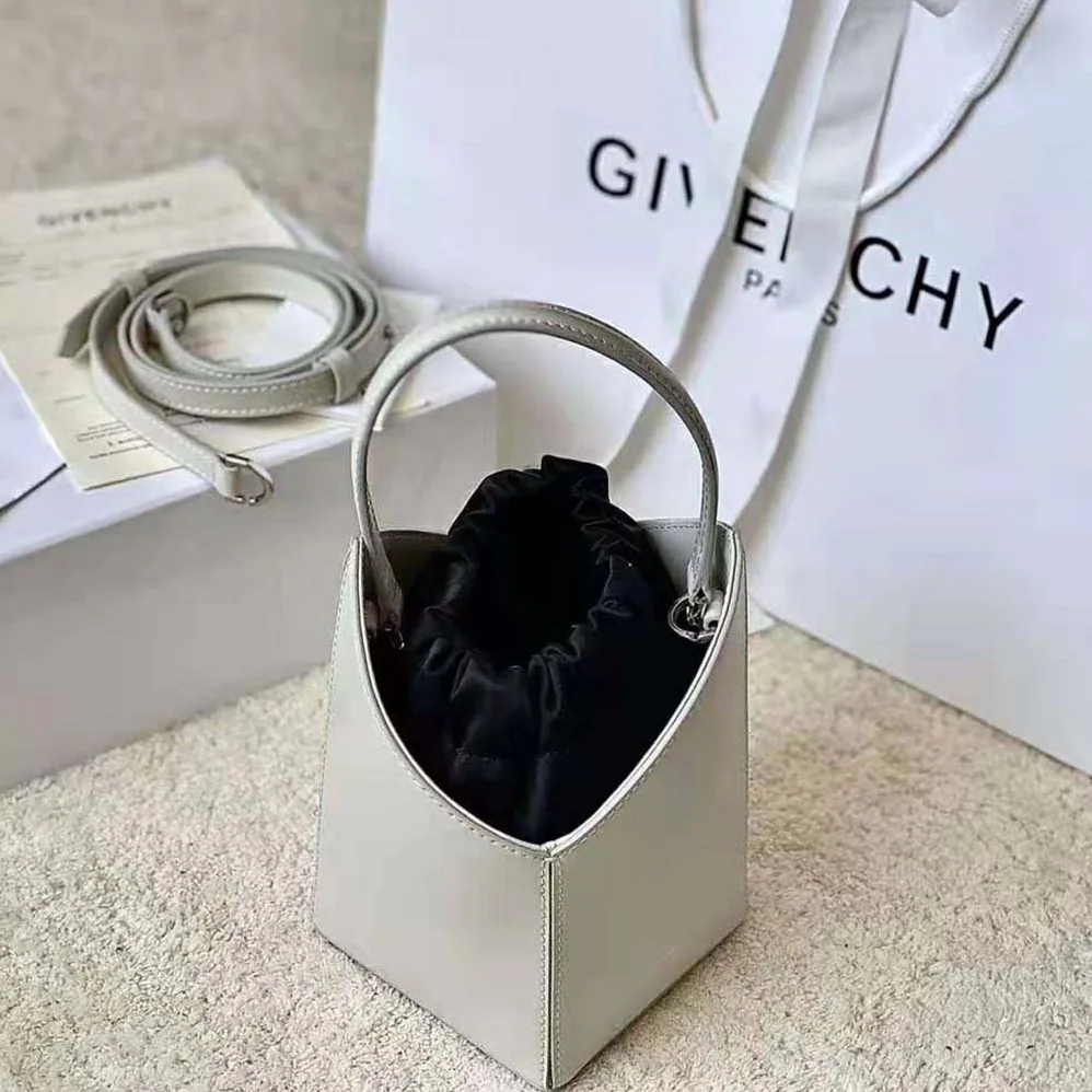 Givenchy Mini Cut Out Bucket Bag in Box Leather for Women in White Givenchy Mini Cut Out Bucket Bag in Box Leather for Women in White