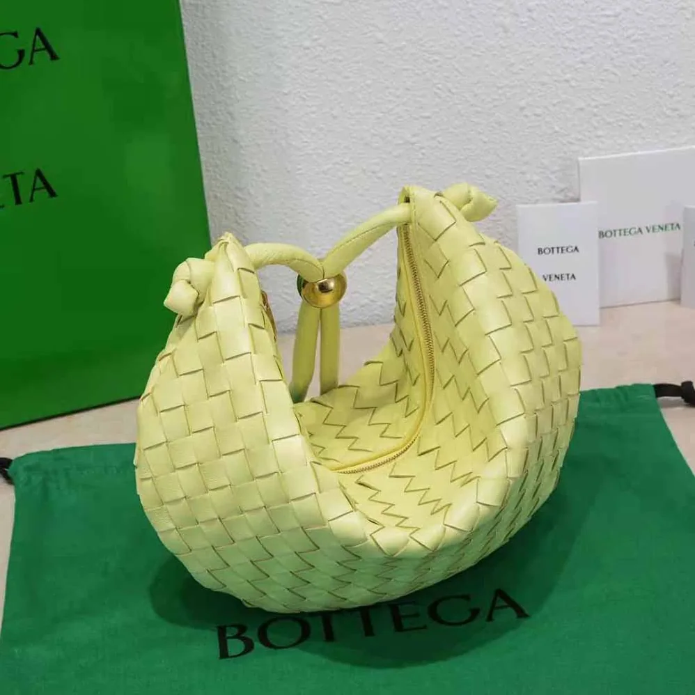 Bottega Veneta Turn Medium Intrecciato Leather Pouch with Adjustable Strap for Women in Yellow Bottega Veneta Turn Medium Intrecciato Leather Pouch with Adjustable Strap for Women in Yellow
