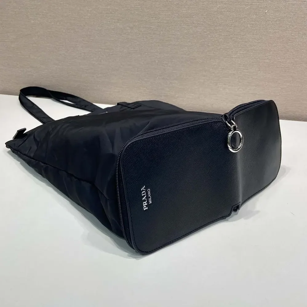 Prada Saffiano Leather Pendant With Re-Nylon Tote Bag for Women in Black Prada Saffiano Leather Pendant With Re-Nylon Tote Bag for Women in Black