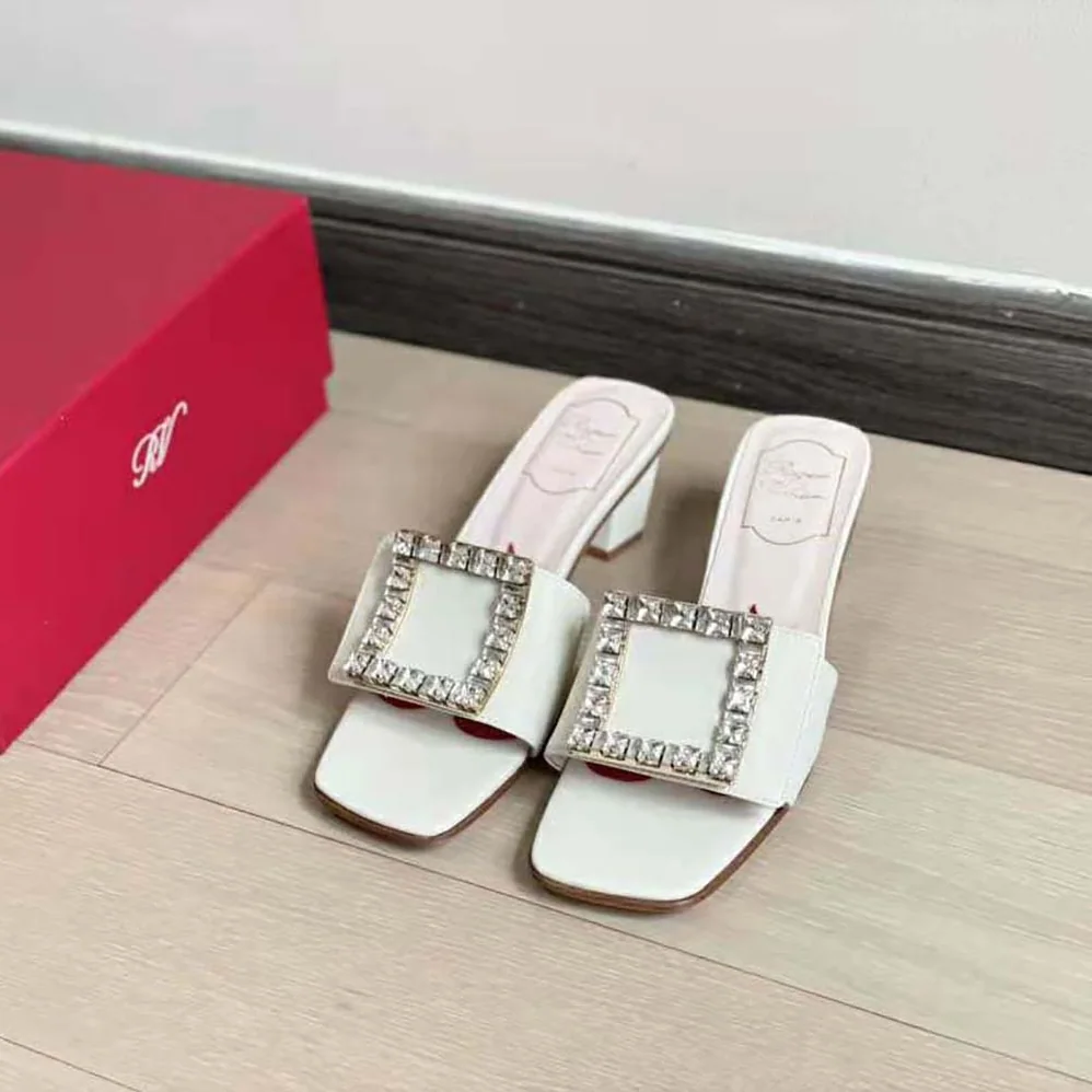 Roger Vivier Biki Love Strass Buckle Mules in Leather for Women in White Roger Vivier Biki Love Strass Buckle Mules in Leather for Women in White