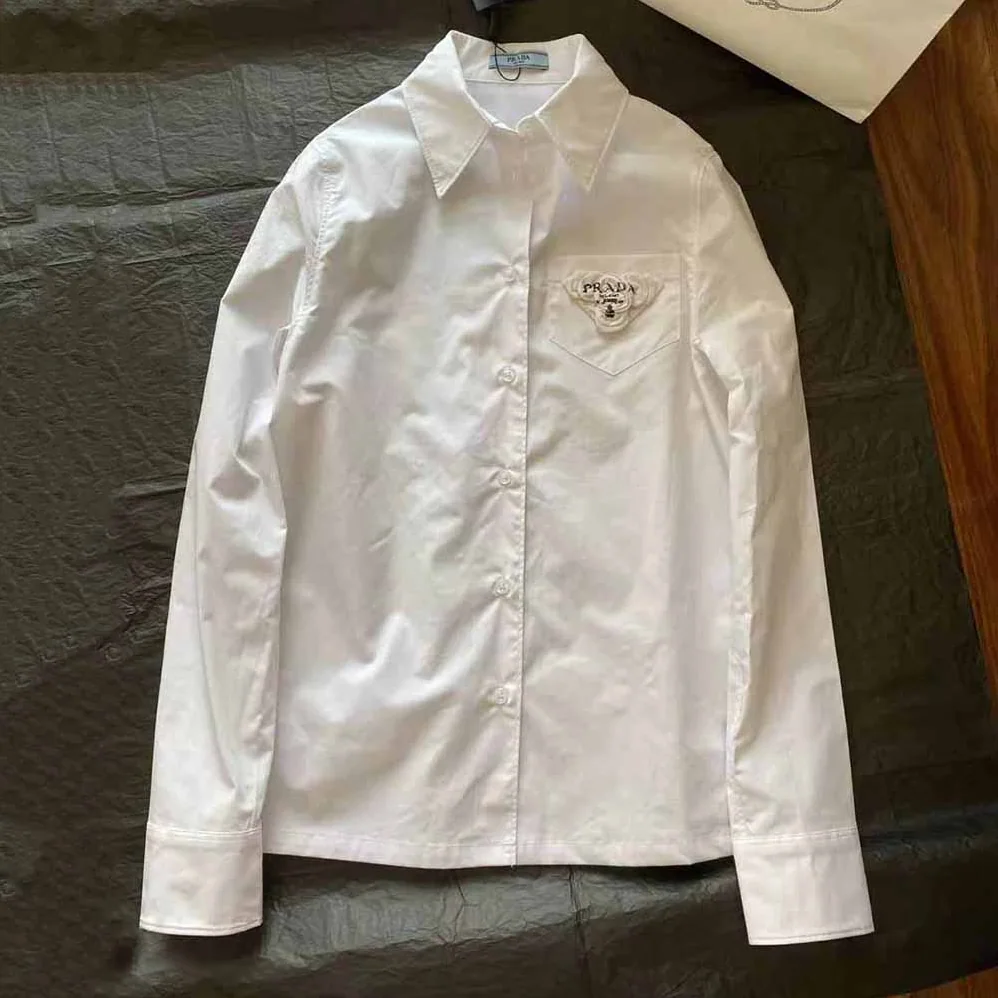 Prada Poplin Shirt Reveals a Complex Simplicity Constantly for Women Prada Poplin Shirt Reveals a Complex Simplicity Constantly for Women