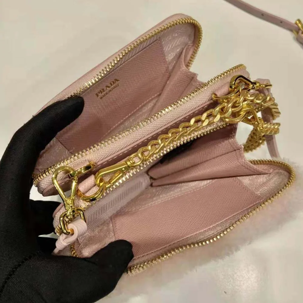 Prada Shearling and Saffiano Leather Mini-Pouch for Women in Pink Prada Shearling and Saffiano Leather Mini-Pouch for Women in Pink