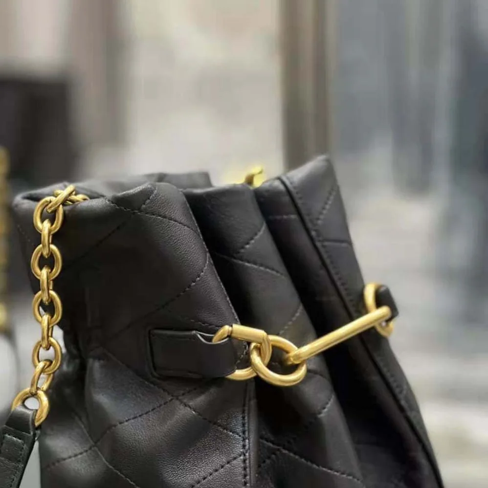 Saint Laurent YSL Le Maillon Hook Bucket Bag in Supple Leather for Women in Black Saint Laurent YSL Le Maillon Hook Bucket Bag in Supple Leather for Women in Black